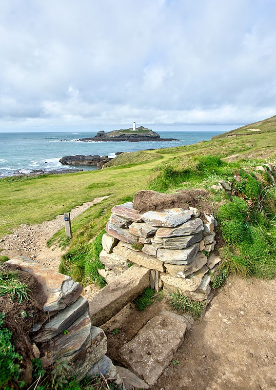 Coast path view of Godrevy Lighthouse - portrait view