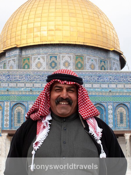 Smiling Arab man in front of The Dome of the Rock,Jerusalem, Israel - World's Major Religions