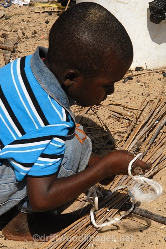 Senegal Fulani Senegal village boy making basket 5 detailo - Senegal Fulani Village