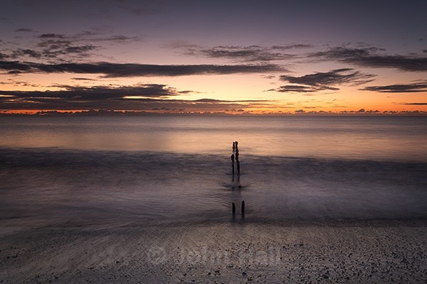 Breaking Wave At Sunrise, Redbarn Beach, Co. Cork, Ireland.