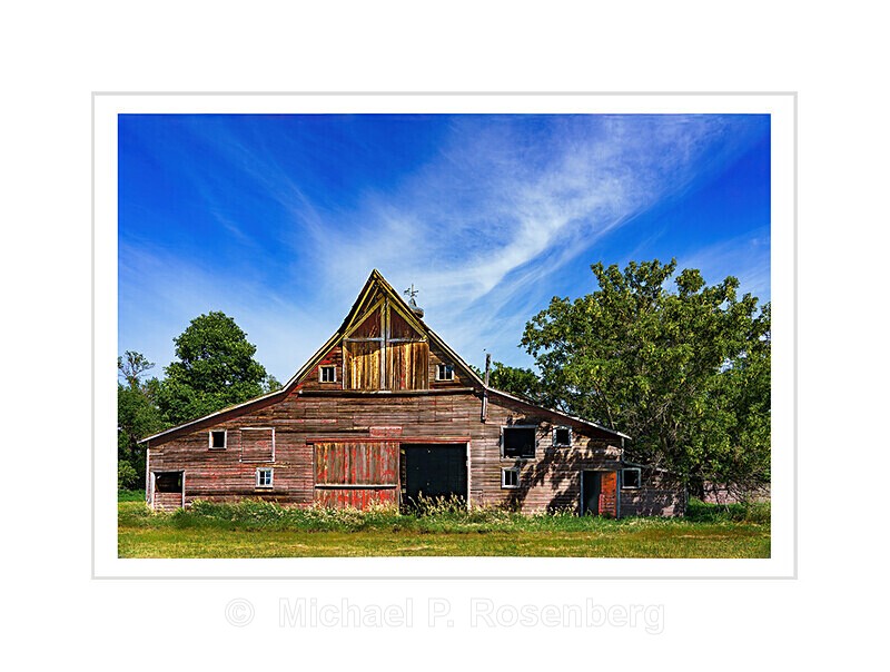 Red Barn With Streaming Clouds, ND - HOME ON THE PRARIE