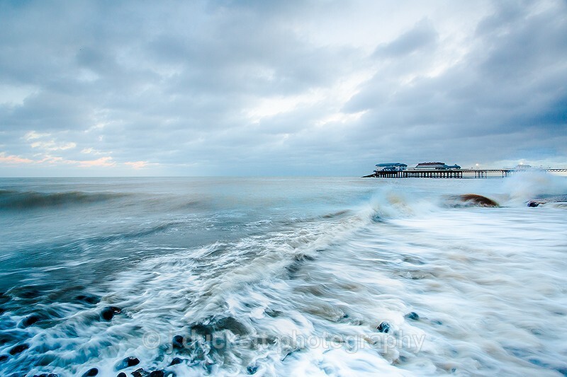 Pier in Rolling Waves