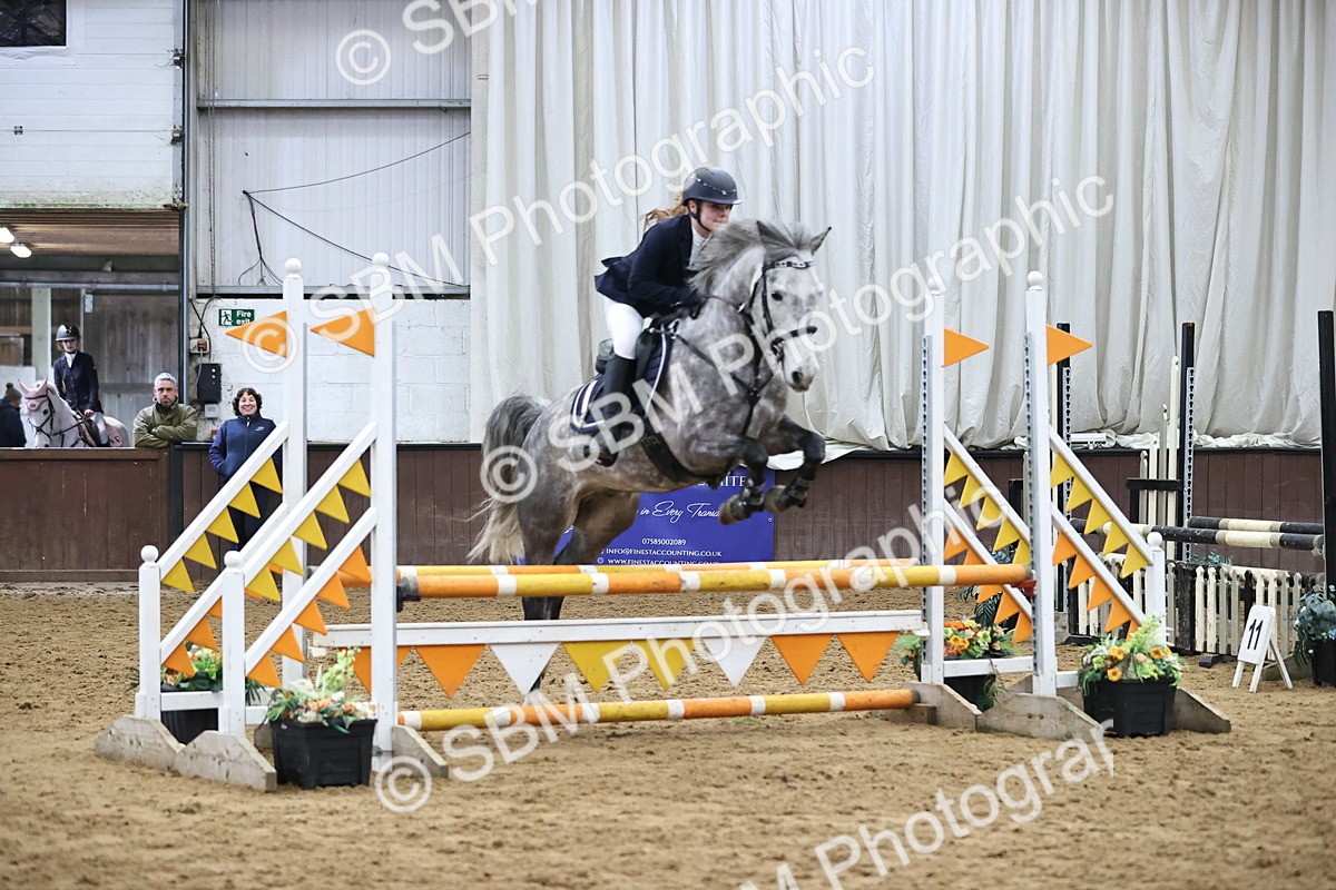 SBM_009686_Class 2 - Pikeur Pony Winter Novice Championship Qualifier - Cart - Emma