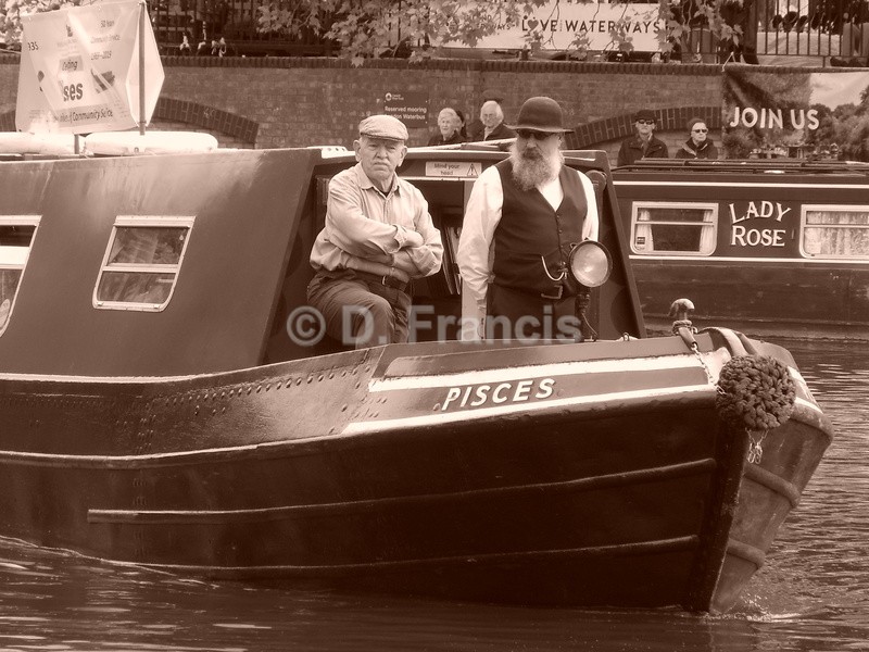 Two men on barge (sepia) - Little Venice Cavalcade