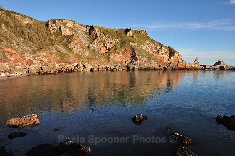 Golden morning reflections at Anstey's Cove - Anstey's Cove and Redgate
