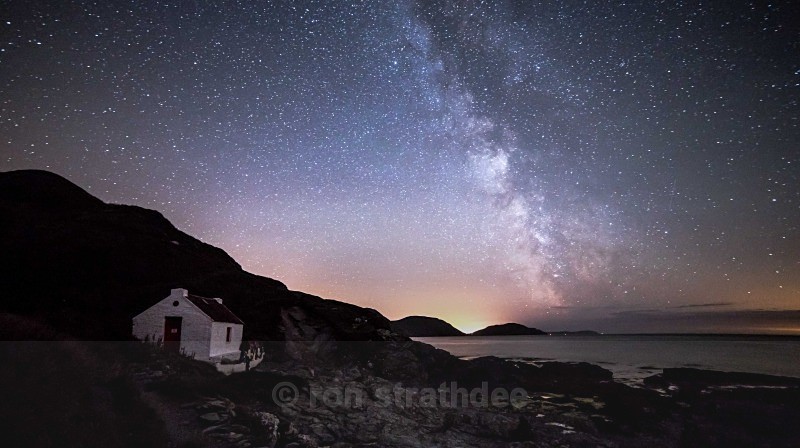 Fisherman's cottage at Niarbyl and Milky Way - Skies of Man