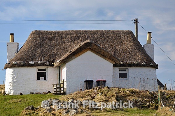 Restored crofters cottage now used as a Youth Hostel. - Island of South Uist in the Outer Hebrides