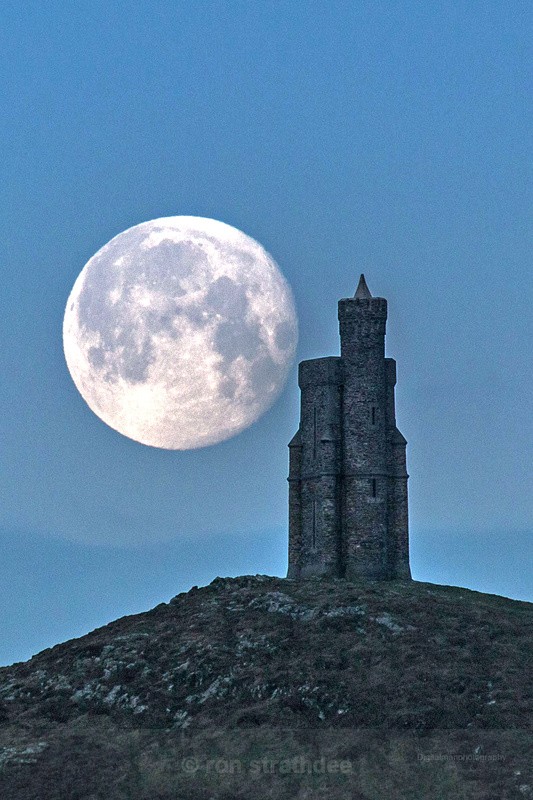Milner's Tower and setting Moon - Skies of Man