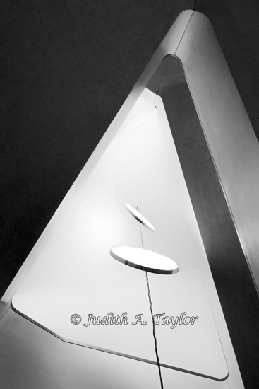 Circular lamps in triangular staircase