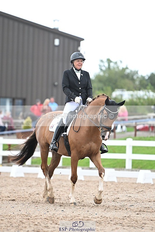 250907-141332-09202 - 007-Karen.DanceHevans.Sign.of.the.Times