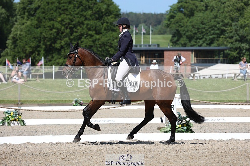 230526-111959-06033 - 151-GREANNANSTOWN_QUARRYMAN_GIRL-Grace_Taylor-WEDTrotUp+DR