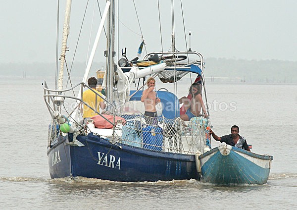 070118 Yara gets a tow up the suriname River - ATLANTIC CROSSING 2006