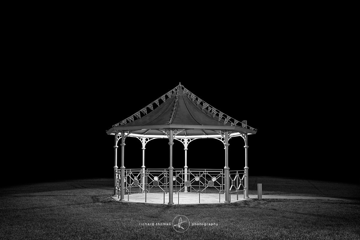 Bandstand in a park at night
