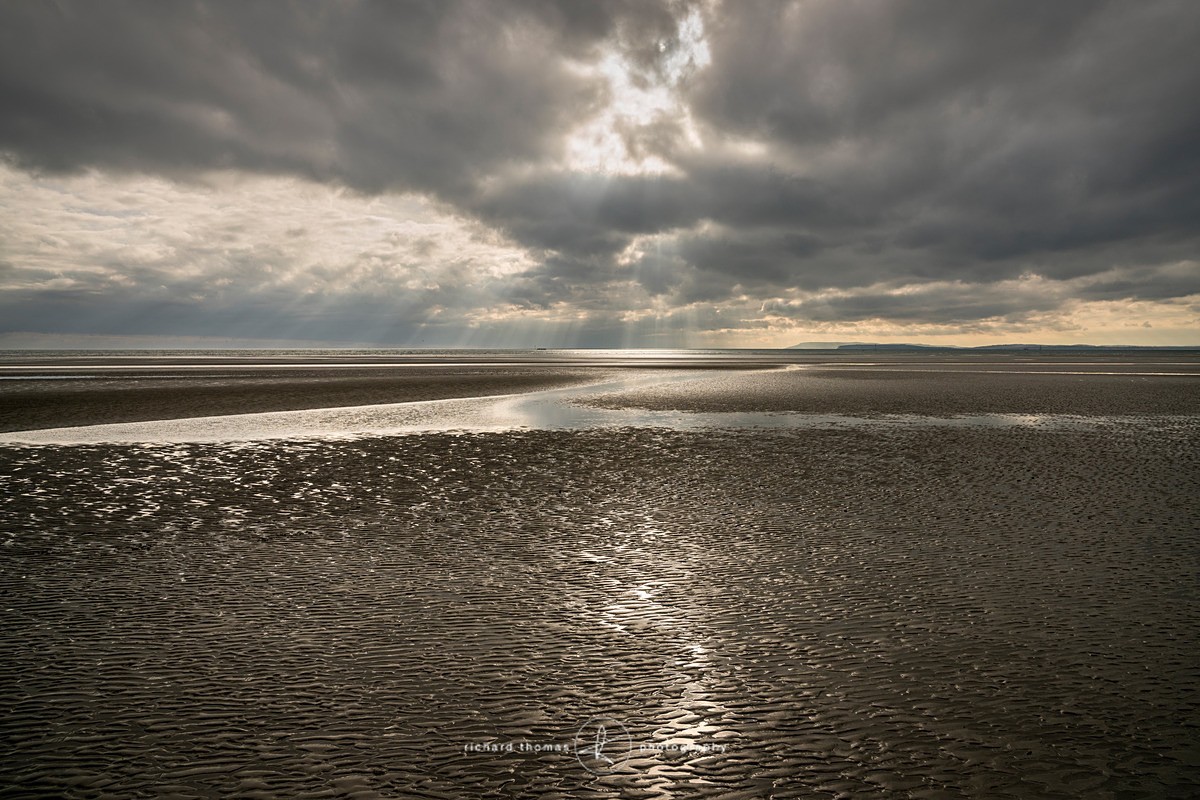 Ripples in the sand on West Wittering beach at low tide
