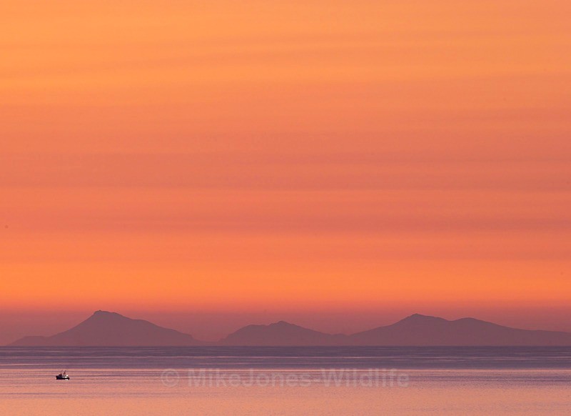 Sunset over the Hebrides taken from the Isle of Mull - Sea Mist, Moonset and Sunset over the Hebrides seen from the Isle of Mull