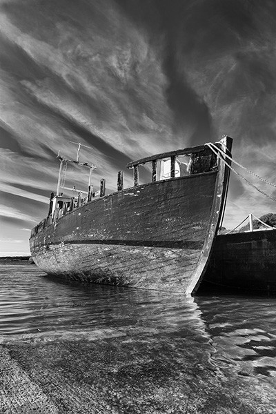 Fine art monochrome of old trawler at Burtonport pier, co. donegal, ireland.