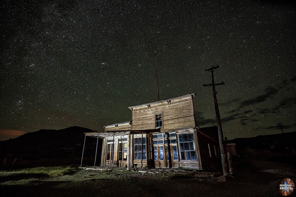 The Ghost Town of Bodie, California | Wheaton & Hollis Hotel by Night - Bodie, California