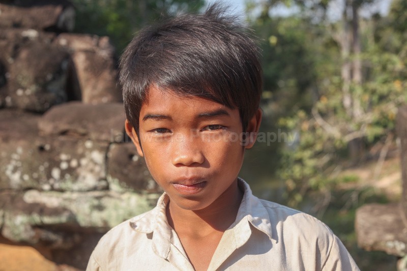 Young boy selling items to make money to live at Ankor Wat in Cambodia - Cambodia - People, Places and Wildlife