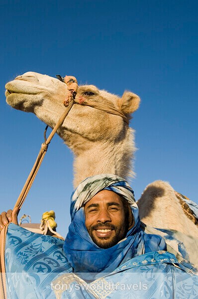 Smiling Man with camel, Morocco - Smiling faces of the World