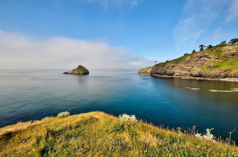 Thatcher Rock viewed from Hope's Nose as the morning mist clears