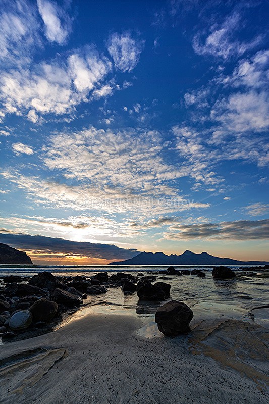 The Isle of Rum from Bay of Laig, Isle of Eigg - Portrait format
