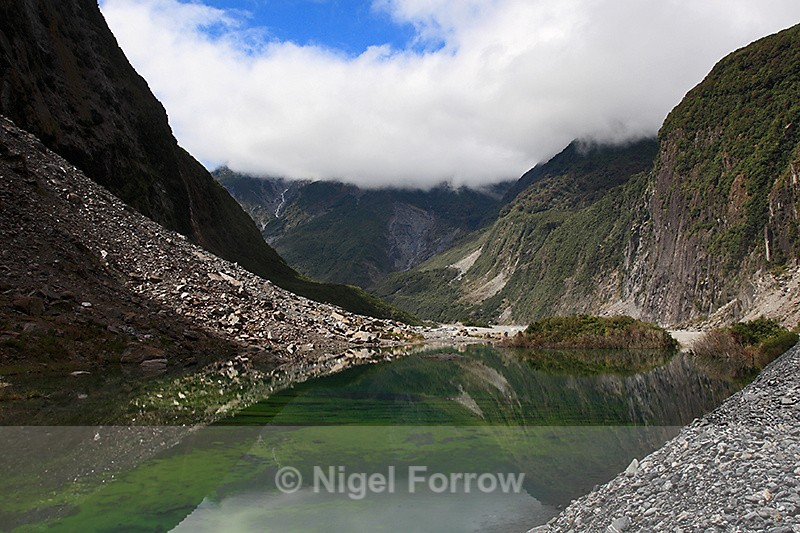 Reflection in lake on the approach to Fox Glacier - New Zealand
