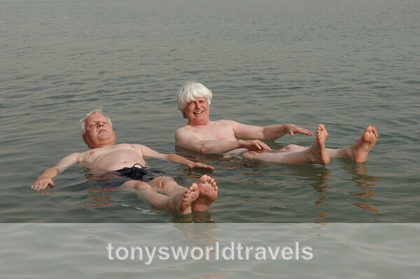 Smiling and floating on the Dead Sea, Israel - Smiling faces of the World