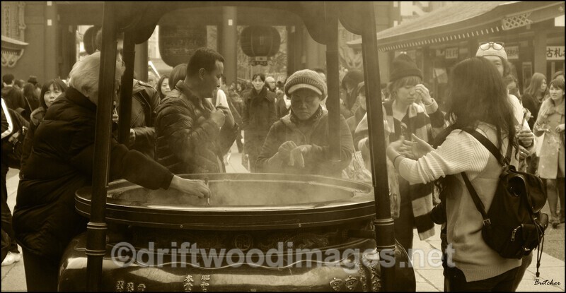 Japan Tokyo Temple incense burner people in smoke 4 sepia - Japan