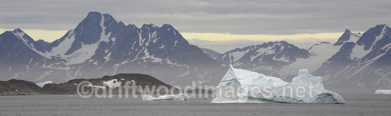 Mountain coast and iceberg - Greenland