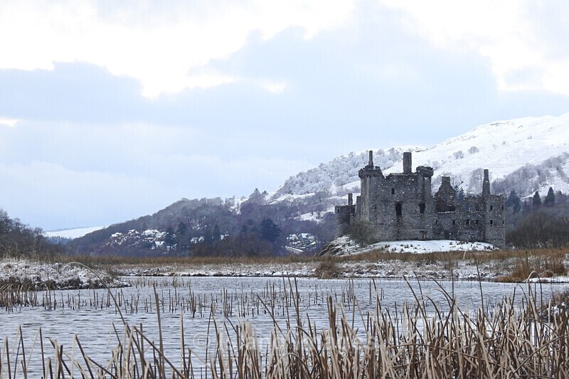 A snow covered Kilchurn Castle - Snowy Photos in Argyll