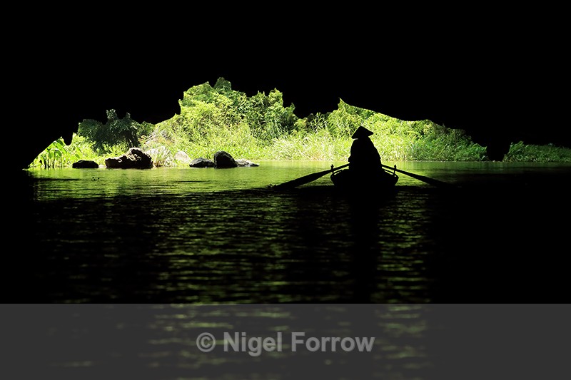 Boat silhouette, Tam Coc caves, Ninh Binh, Vietnam - Vietnam