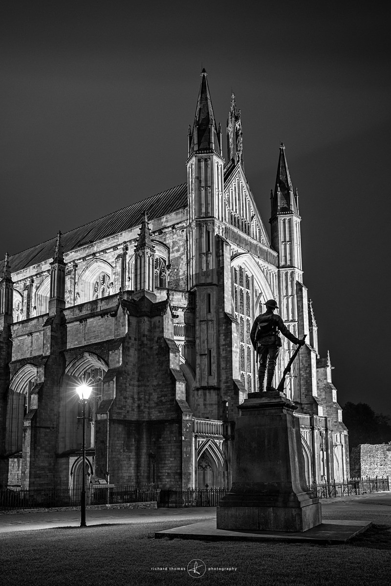 Rifleman memorial at Winchester cathedral at night