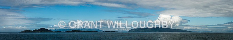 The islands of Muck (left) Eigg (right) Rum (backgroud) panorama - Panorama