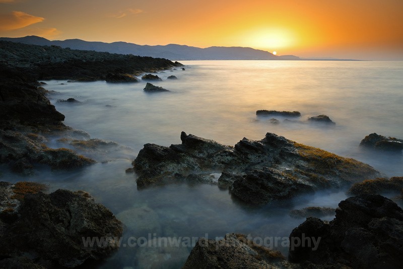 Sun setting at Sissi, Crete.    Ref 2311 - Europe