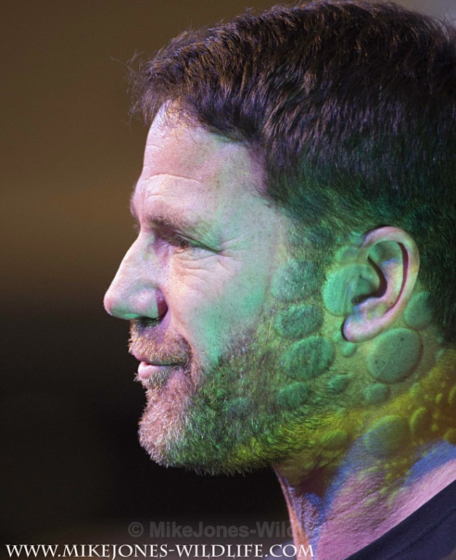 Steve Backshall at Whalest with projector image on face - STEVE BACKSHALL images from Whalest 2014 in Brighton