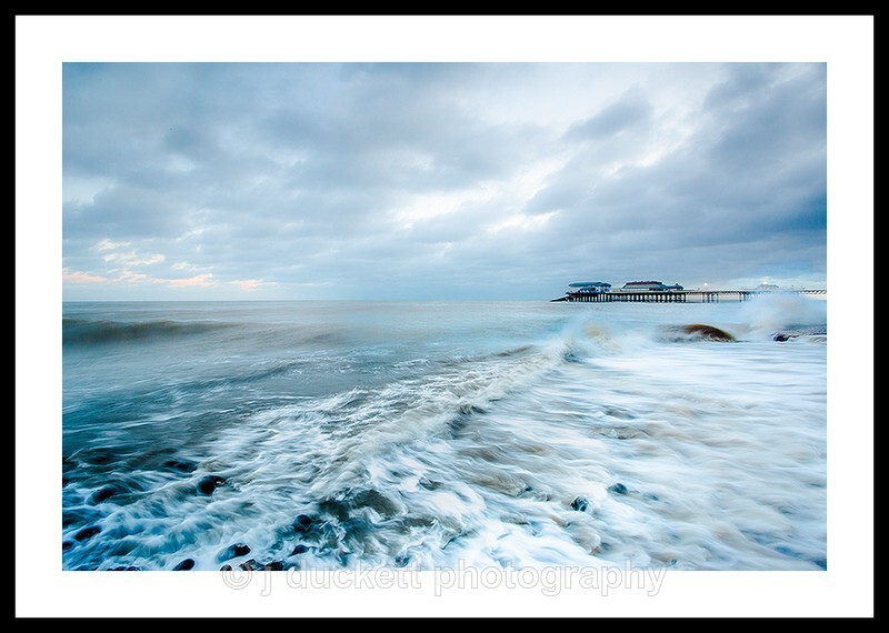 Pier in Rolling Waves