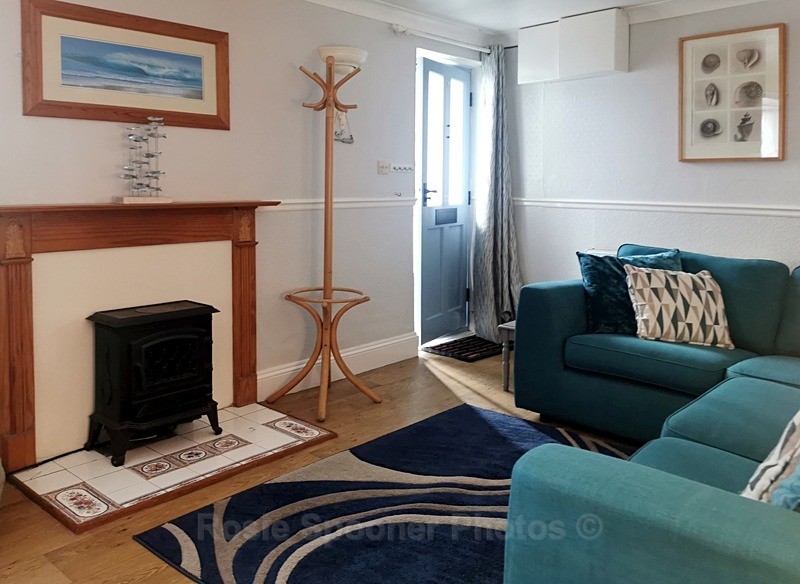 Fire, front door and corner area - ROSIE'S HOLIDAY LET DOLPHINS