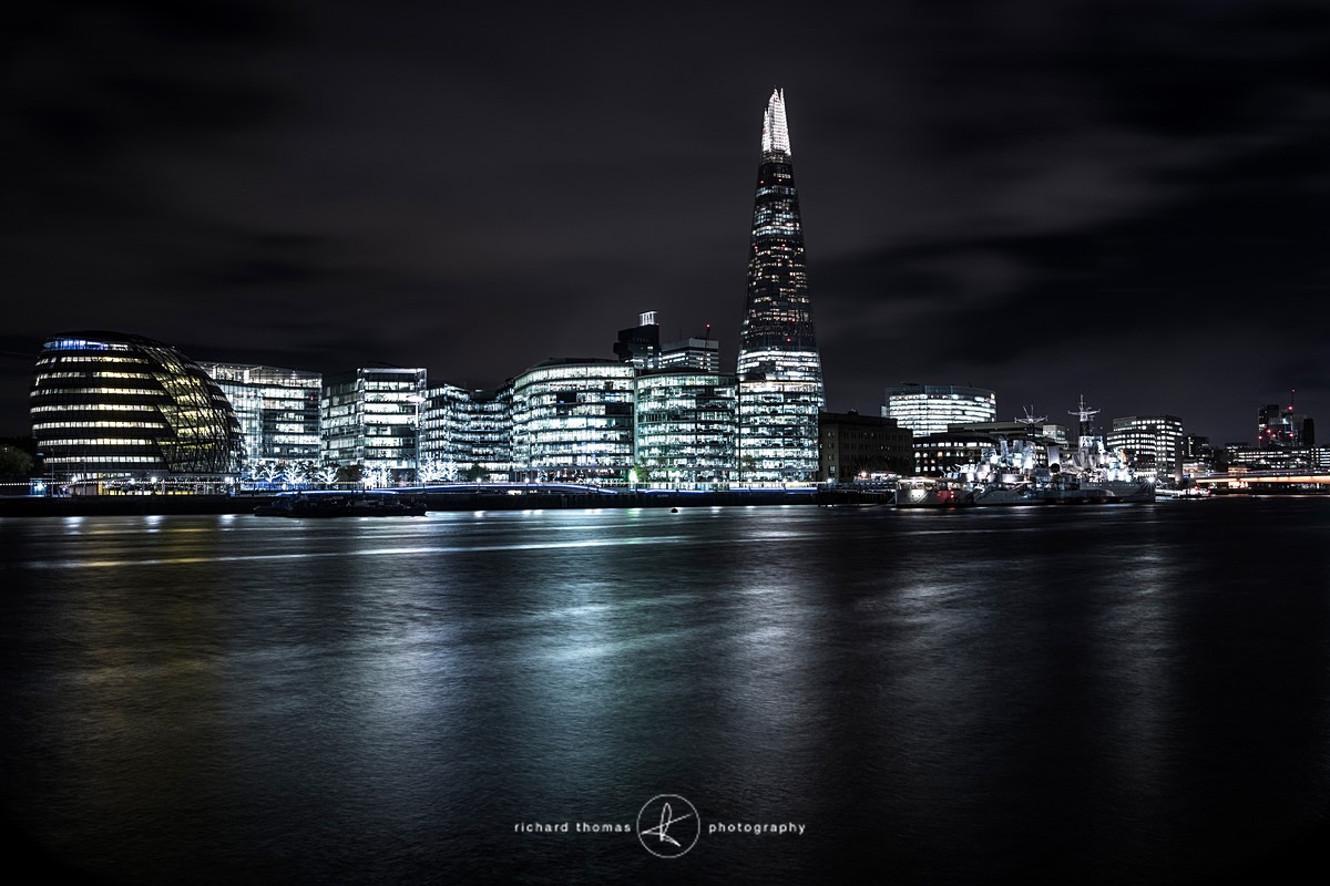 Looking across the River Thames at night towards the Shard