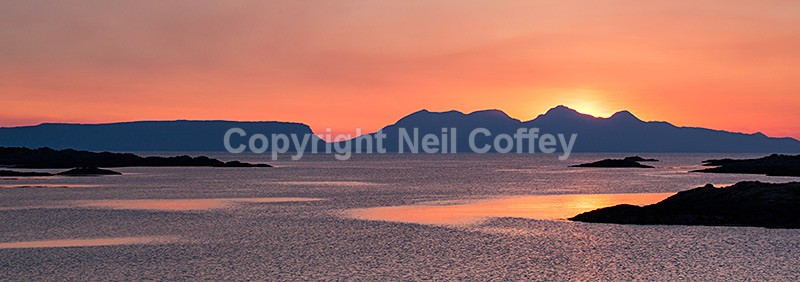 The Isles of Eigg and Rum across Lon Liath near Arisaig, Highland - Panoramic format