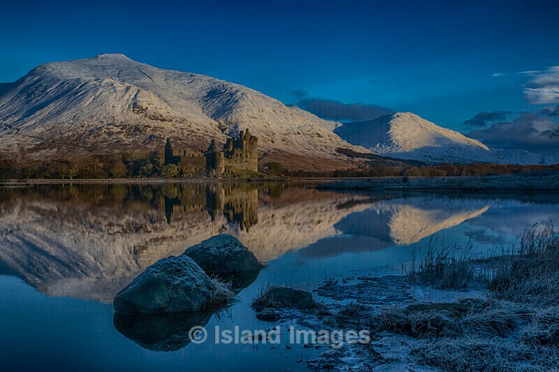 A cold day across the Loch with snow in the hills - Kilchurn Castle