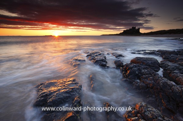 Sunrise over Bamburgh Castle. Ref 2191 - Northumberland
