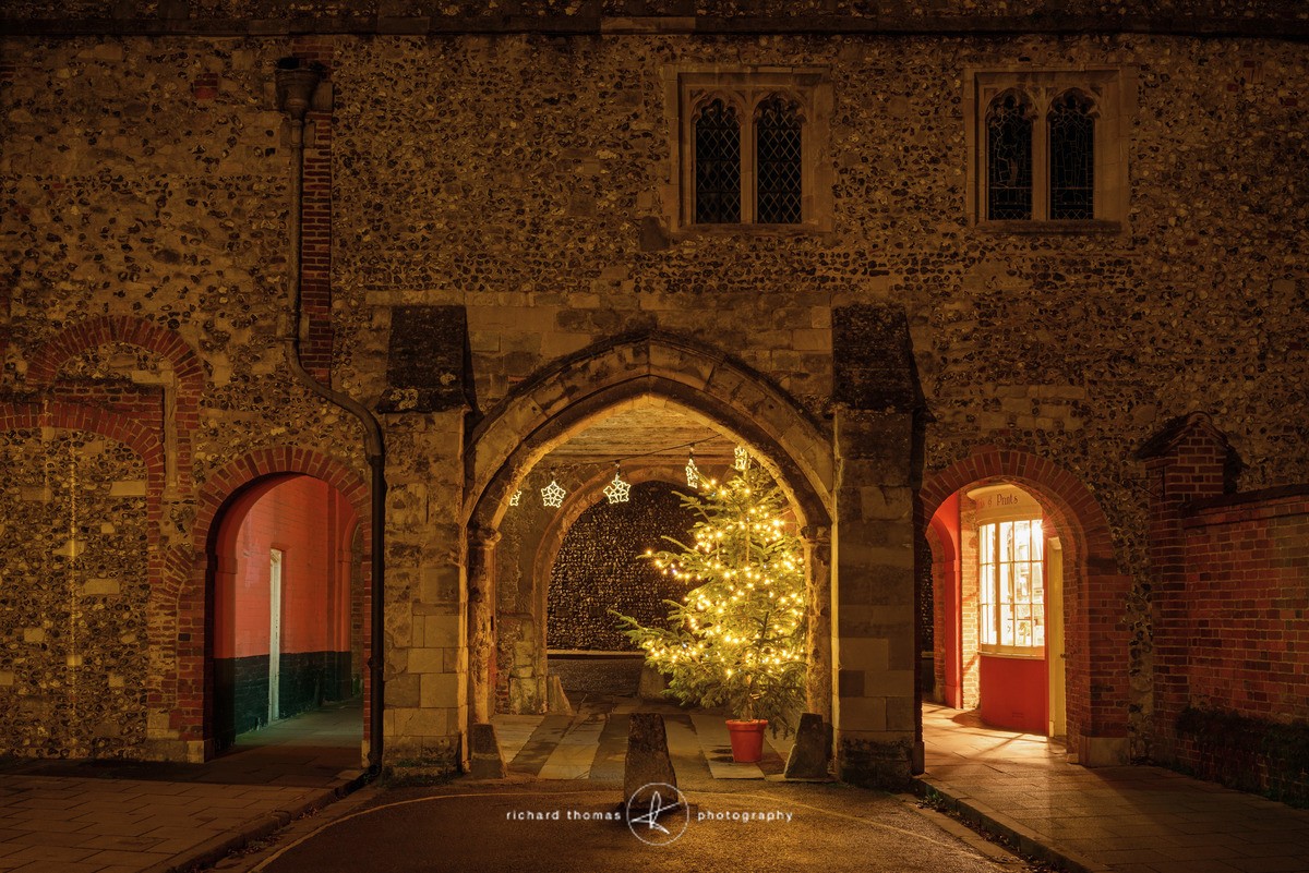 Christmas tree by Kingsgate in Winchester at night