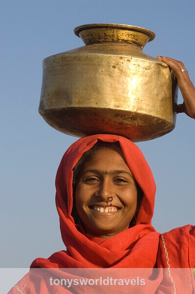 Woman in Red, Rajasthan,  India - Smiling faces of the World