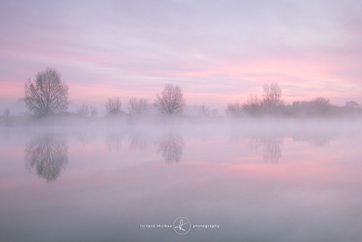 Mist rising at dawn on the Jubilee River near the Thames in Windsor
