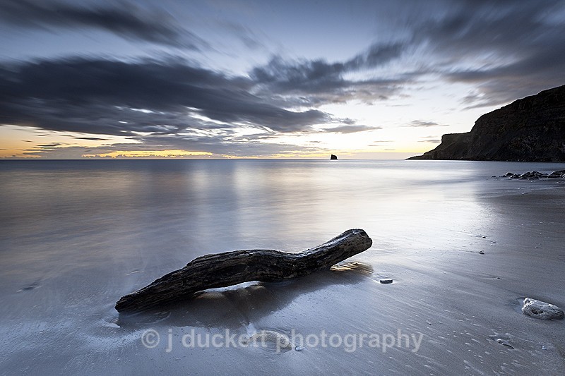 Long exposure dawn landscape photography of Saltwick Bay on the north Yorkshire Coast
