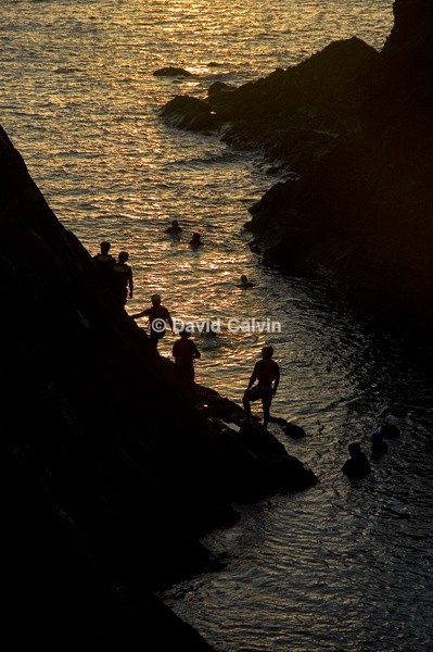 Coasteerers At Sunset - Coast