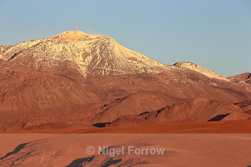 Active volcano Putana at sunset, Chile - Chile