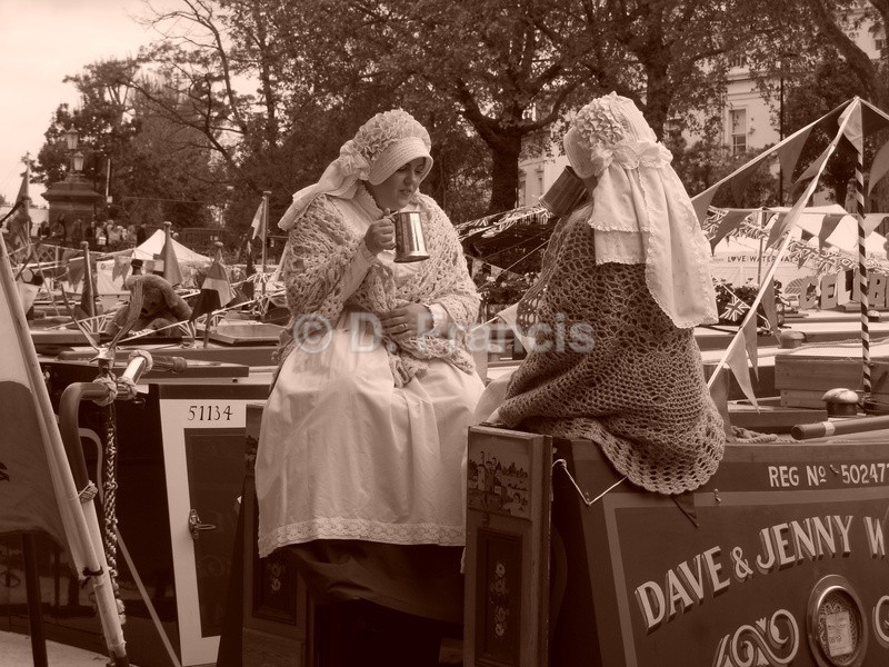 Two girls on canal boat (sepia) - Little Venice Cavalcade