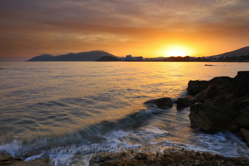 Sunset over Santa Eulalia from Cala Talamanca beach, Ibiza.   ref0384 - Europe