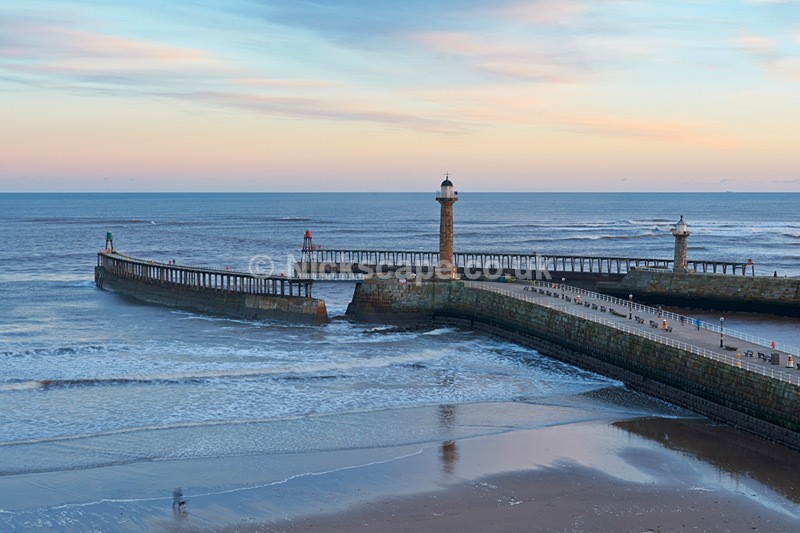 People Enjoying Whitby Piers at Sunrise - Yorkshire Coast - Yorkshire